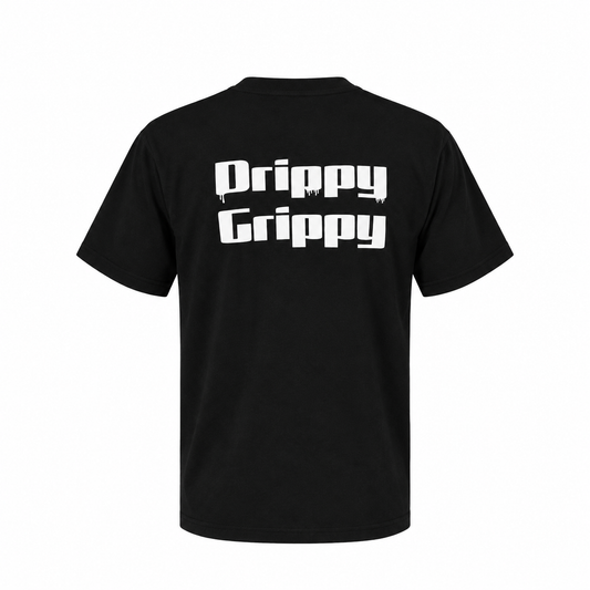 A black short-sleeve t-shirt shown from the back, featuring the words 'Drippy Grippy' printed in a bold white stylized font across the upper back.